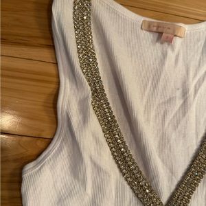 Beautiful Woman’s Small rhinestone lined collar T shirt .